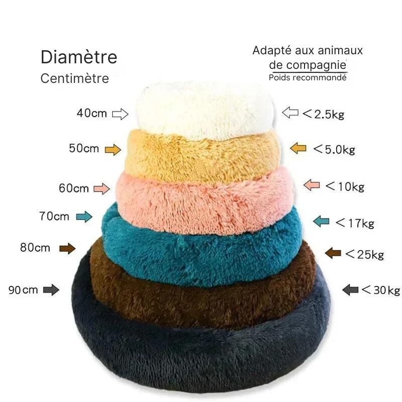 Lit Donut SnugNest, moelleux et confortable, en tissu fleece corail doux, disponible en plusieurs couleurs et tailles.